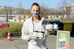 Karolina Pliskova serves coffee and gifts to Monaco firefighters