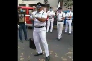 Kolkata cops croon 'we shall overcome' to cheer up citizens amid lockdo