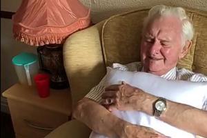 Caregiver's gift to elderly man sleeping with wife's photo wins hearts