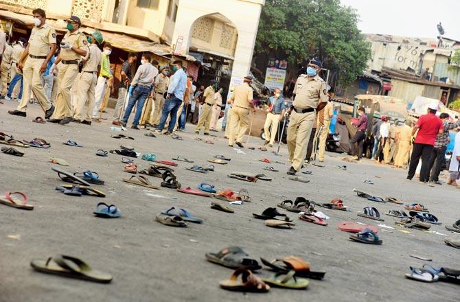 Strewn footwear of the dispersed crowd at the station at Bandra West on Tuesday