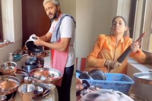 Riteish washes dishes as Genelia supervises with belan in her hand