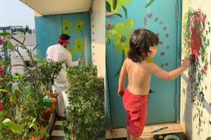Kareena shares picture of Taimur, Saif painting their balcony walls