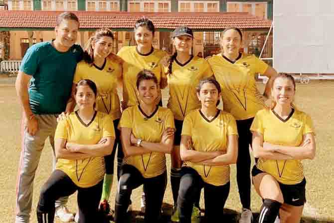 Tarini Mohinder (first line, second from left) with her football team