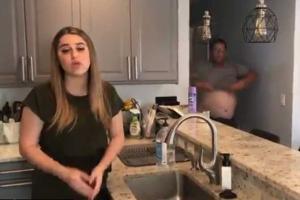 Video shows reporter working from home interrupted by shirtless dad