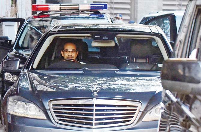 Chief Minister Uddhav Thackeray seen driving his own car on his way to attend a meeting at the civic headquarters. Pic/Suresh Karkera
