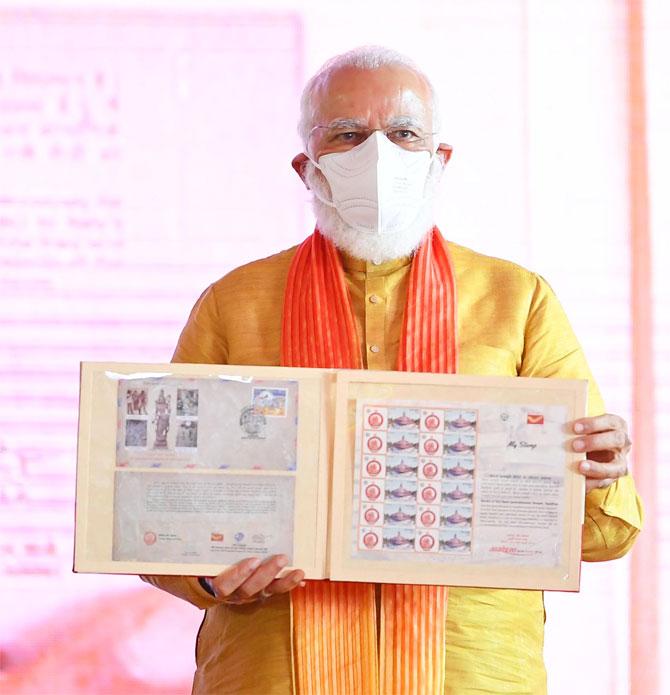 In photo: Prime Minister Narendra Modi with a commemorative postage stamp on 'Shri Ram Janmabhoomi Mandir'.