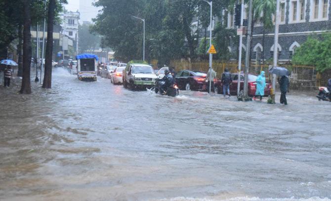 Heavy rains, accompanied by cyclonic winds, lashed parts of Mumbai and neighbouring Thane and Palghar districts on Wednesday, affecting local train and bus services due to severe water-logging on rail tracks and roads.