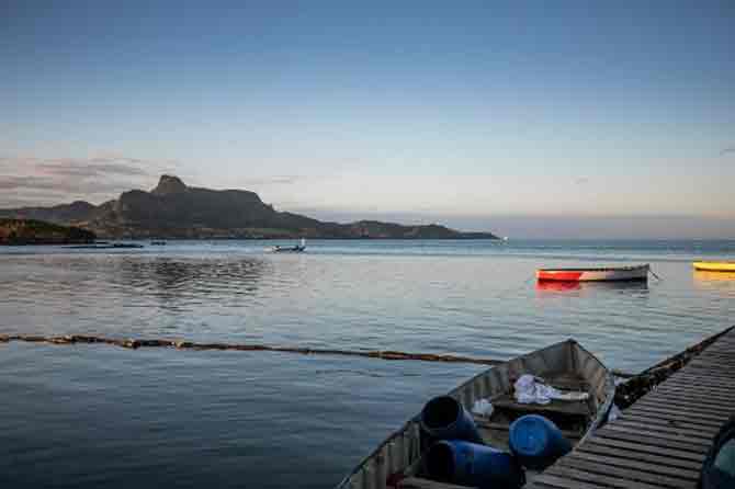 Pravind Jugnauth's government is under pressure to explain why it did not take immediate action to avert the environmental disaster.
In picture: A handmade oil barrier is seen in the water at the Mahébourg waterfront in Mauritius.