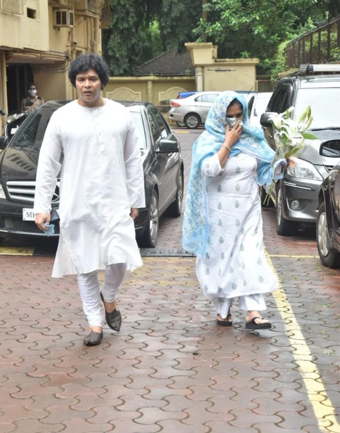 Late classical singer Pandit Jasraj's 'antim darshan' was held on Thursday at his family residence in Versova, Mumbai, in the presence of his close family and friends. Several celebrities including Anup Jalota, Rukhsar, Kailash Kher, Udit Narayan and Jatin Pandit paid their last respects. He was later cremated at Vile Parle's Pawan Hans Crematorium with full state honours. The maestro died on Monday, August 17, at the age of 90. (All pictures: Yogen Shah)