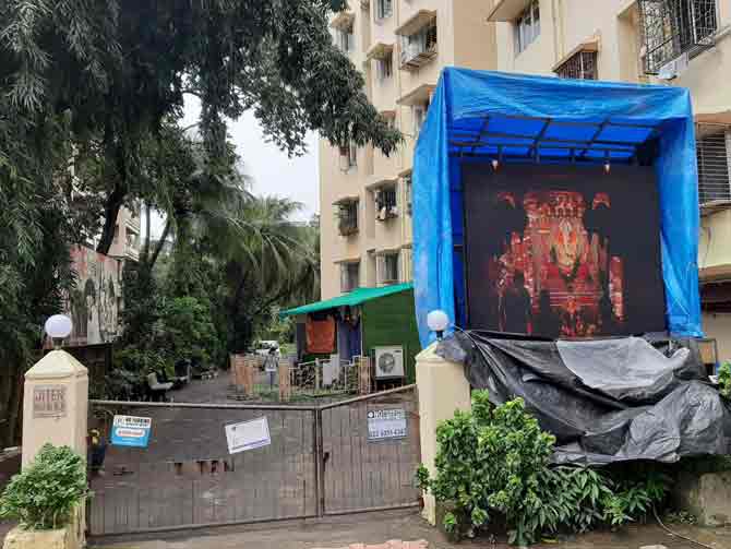 In picture: A housing society in Andheri installed an LED screen at the entrance gate of the society for showcasing the puja being held in the pandal in the building premises.