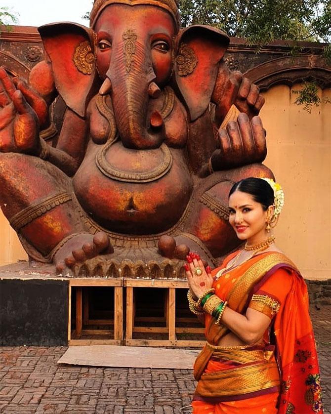 Sunny Leone too took to social media to extend greetings and celebrate the auspicious occasion. She posted this throwback picture of hers in the traditional Maharashtrian attire, with Lord Ganesh's idol in the background. She wrote alongside, 