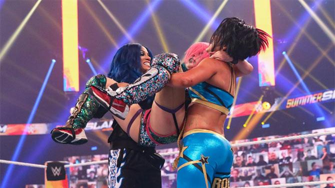 Sasha Banks, Bayley's buddy, proved to be the difference maker in the match. Asuka went to launch a hip attack on Bayley but accidentally hit Sasha. This gave Bayley a chance to roll-up Asuka and pick up the win and retain her title.