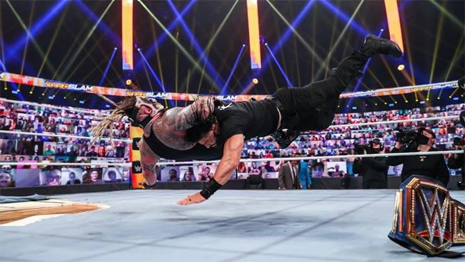 However, 'The Fiend' Bray Wyatt's celebration was short lived as Roman Reigns made a shocking return and delivered a Spear onto Wyatt before viciously attacking him. 