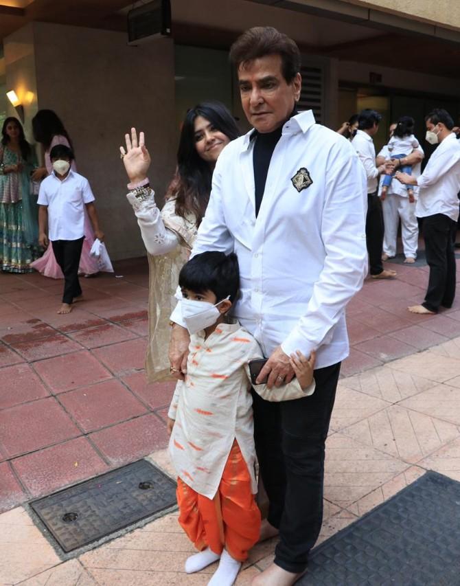 The celebrations might have been subdued this year due to coronavirus pandemic and the subsequent lockdown, but it failed to damper the spirit of the Kapoor's. The family continued the tradition of bidding adieu to Lord Ganesh's Idol with great fanfare.
In pic: Jeetendra with his grandson Laksshya.