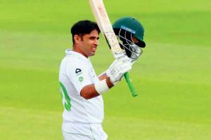 Abid Ali's 50 lights up Rose Bowl on dull day 