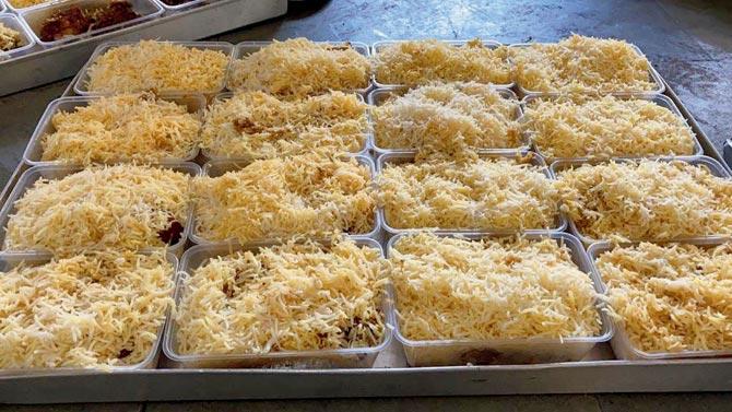 Trays of Parsi mutton pulao ready for delivery