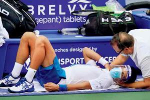 No. 1 Novak Djokovic overcomes neck injury to enter final