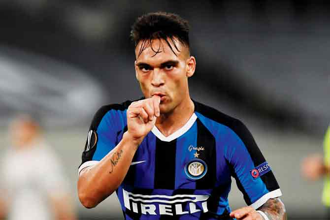 Inter Milan’s Lautaro Martinez is ecstatic after scoring on Monday