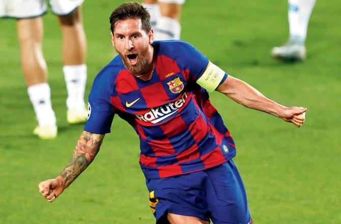 Messi celebrates his goal against Napoli
