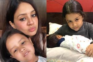 Sakshi shares photo of Ziva with newborn baby; leaves fans guessing