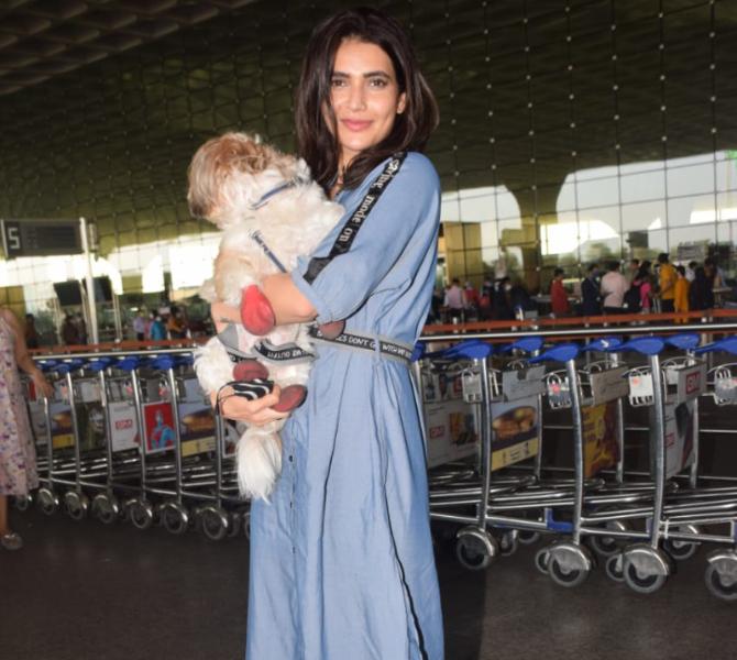 Karishma Tanna dressed in a blue dress was also spotted at the Mumbai airport along with her furry friend. Recently, the Sanju actress had gone for a much-needed holiday to Dubai, and her Instagram account was full of fun posts from her trip.