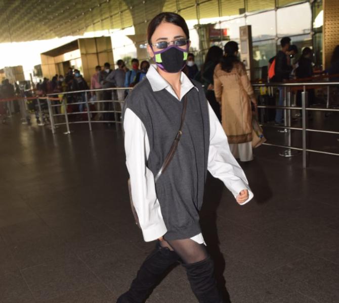 Angrezi Medium actress Radhika Madan was also spotted at Mumbai airport. She wore a white shirt and grey jacket as she posed for the photographers.