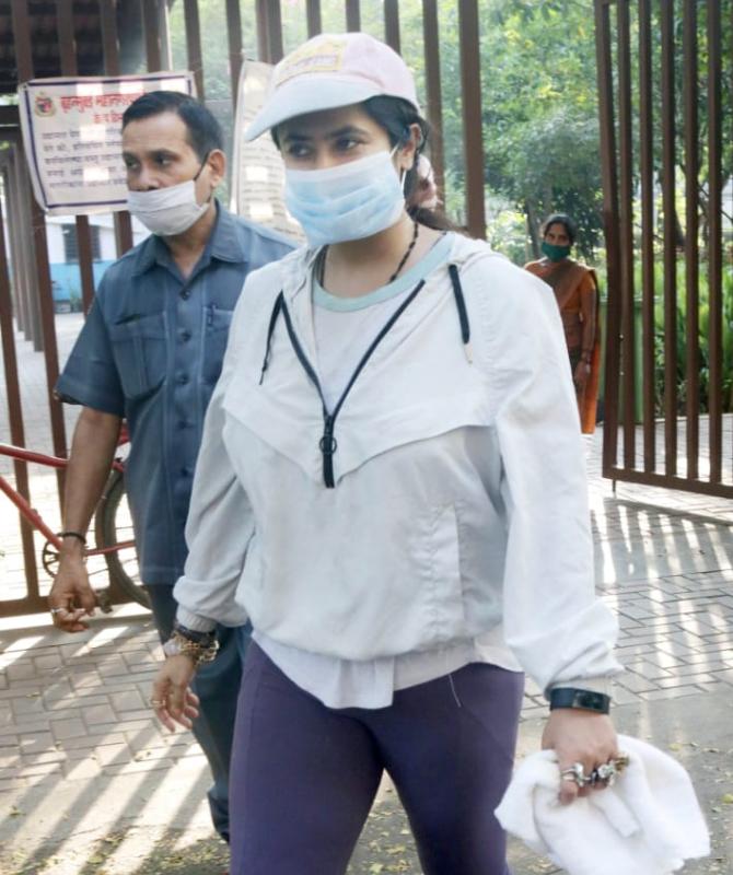 Ekta Kapoor was snapped at the same location. She opted for a white t-shirt and purple trousers for the outing.