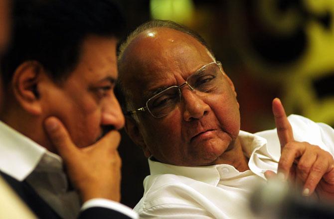 Pawar is credited with maintaining a balance in politics - the result of his rich ground-level experience vis-a-vis the Twitter-Facebook approach of modern-day politicians.
In picture: NCP supremo Sharad Pawar with former Maharashtra CM Prithviraj Chavan in Mumbai. Pic/Bipin Kokate