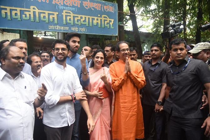 In picture: Uddhav and Rashmi Thackeray with their sons, Aaditya and Tejas pose for the shutterbugs after casting their vote in the state assembly elections.