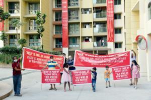 Marol residents take to streets with banners in stir against builder