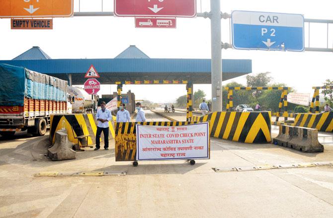 Three health workers are seen at Dapchari checkpost on December 18