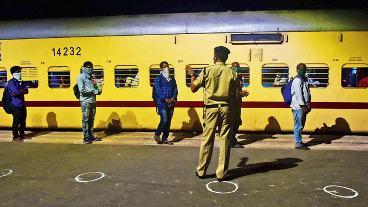 On May 1, after the central government announced special trains, the first Shramik train with migrant workers was flagged off from Maharashtra. Thousands of workers and their families arrived at Bhiwandi railway station from where they took the first Shramik train to Gorakhpur. The migrant workers were also provided with a kit comprising water bottles, food, and biscuit packets.

Photo: Suresh Karkera
