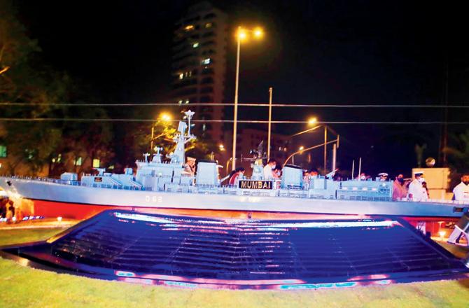 A model of INS Mumbai at the Worli traffic island