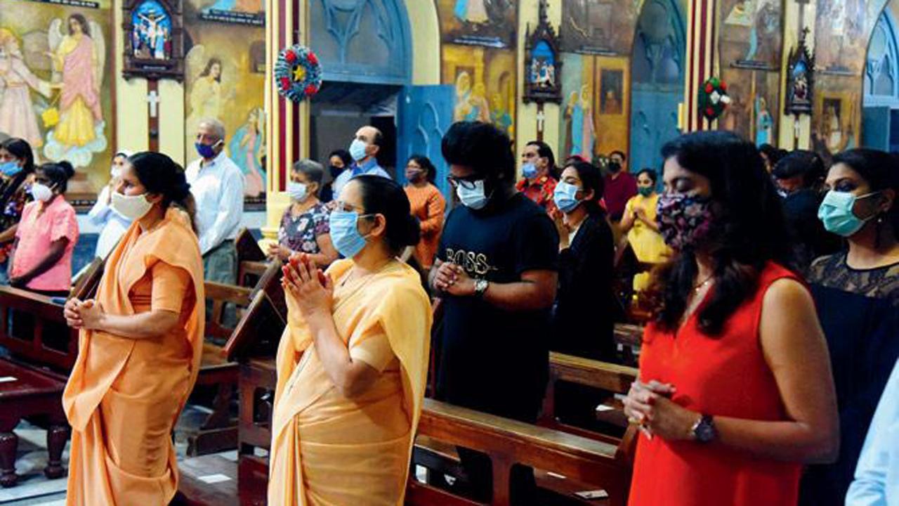 Christians take part in a Mass on the eve of Christmas at Mount Mary Church in Bandra.
Photo: Shadab Khan
