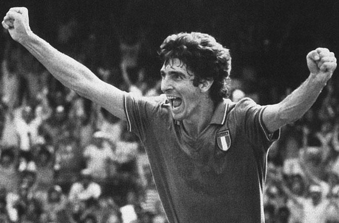 Italy’s Paolo Rossi stretches both arms in celebration after scoring his team’s first goal against Poland during the 1982 FIFA World Cup semi-final at Camp Nou Stadium in Barcelona. Pic/AP;PTI