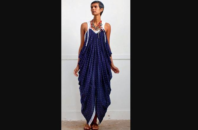 "With the Summer 2010 collection, I revisited traditional Indian shapes and techniques of bias-cut churidar and dhoti drape, quintessential ganjis and fisherman trousers," says Saviojon. Tinu Verghis wears a deconstructed dress with dhoti drape-inspired pleating. Pic/Colston Julian