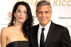 Amal Clooney gushes over husband George Clooney during book launch