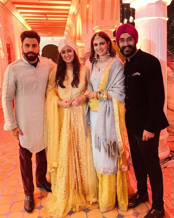 Apart from their BFFs and family members, popular singers Harshdeep Kaur and Badshah also attended the wedding, as they performed at their Sangeet ceremony.
In picture: Gurrick Mann and Simran Kaur Mundi with Harshdeep Kaur.