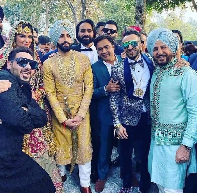 Speaking of Gurrick Mann, the groom was also seen wearing Punjabi Pathani for the wedding ceremony. His mustard yellow embellished kurta, with an aqua blue turban, were a perfect match with the bride's ethnic wear.