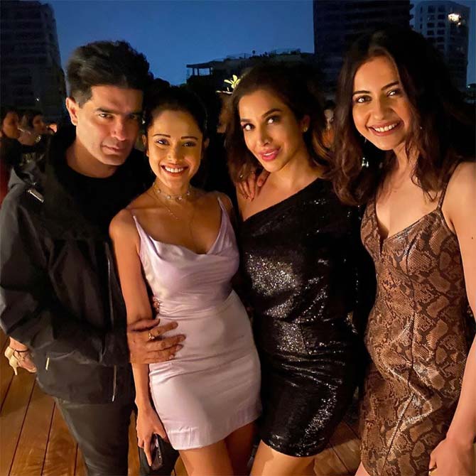 Manish Malhotra shares a close bond with Sophie. In picture: The designer with his muse Nushrat Bharucha, Sophie and actress Rakul Preet Singh.