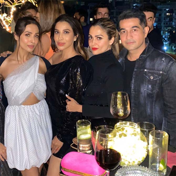 Sophie's BFFs, Malaika Arora and Amrita Arora looked just as glamorous as the birthday girl. While Malla stunned in a polka dot cut-out mini dress, Amrita Arora dazzled in a black outfit with red lipstick.
