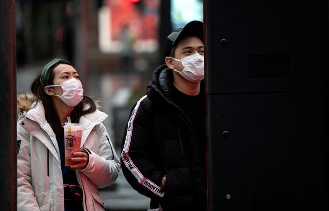 More than 100 people were evacuated from a 35-storey Hong Kong housing block on Tuesday after two residents in different apartments tested positive for the new coronavirus. Residents were forced to leave in the early hours as health officials in masks and white overalls scrambled to work out whether the virus had spread through the complex of some 3,000 people.