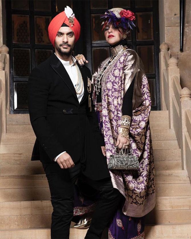The theme of the birthday bash was 'Le Bal Oriental', which means The Ball of the Century. What we understand from the theme is that guests were asked to dress up in their most extravagant and outrageous outfits possible! 
Pictured: Neha Dhupia rocks the party theme with husband Angad Bedi