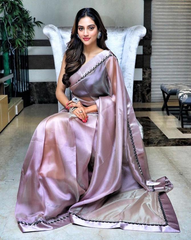 Recently, Nusrat Jahan had shared a few stunning photos of herself in ethnic wear where she was seen bonding with husband Nikhil Jain at her friend's wedding. Donning a multi-coloured sleeveless lehenga which she paired with chunky jewellery, Nusrat looked all set for the 'Shaadi season'!

