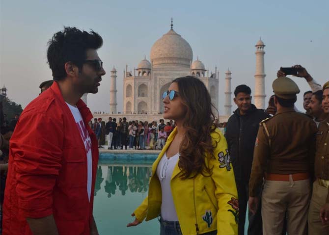 What's wrong with you? This is what Sara Ali Khan seems to be saying to Kartik Aaryan as the rumoured couple gets caught in another candid moment. And Kartik seems to be quite serious in the picture!