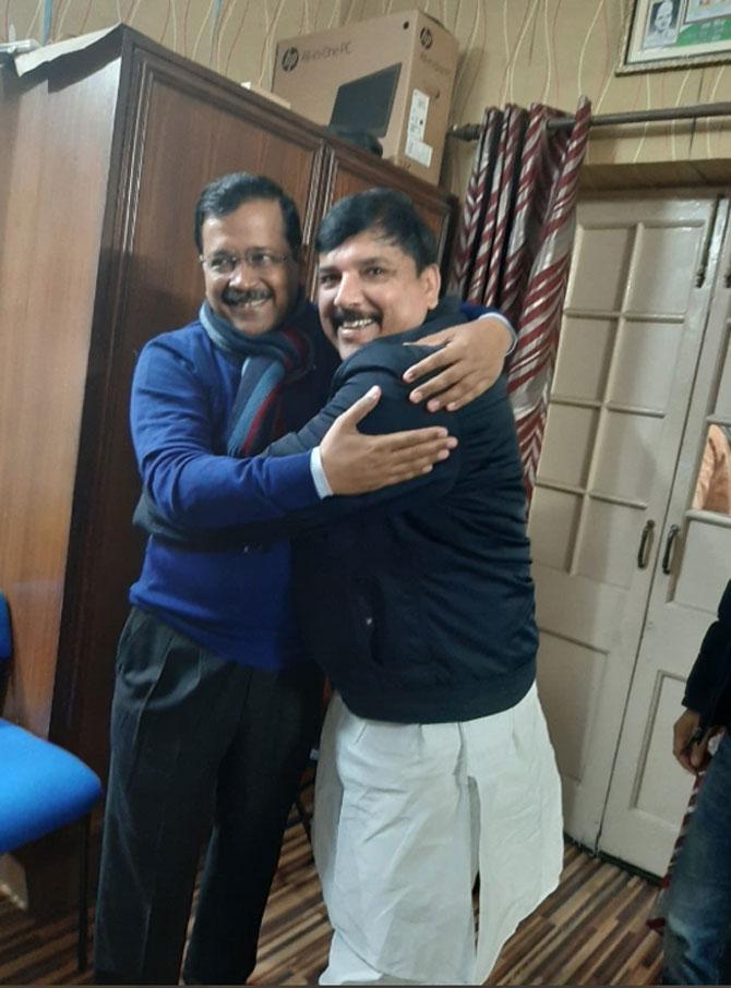 In picture: AAP leader Sanjay Singh poses with Arvind Kejriwal after the party's landslide victory in the 2020 Delhi Legislative Assembly elections 