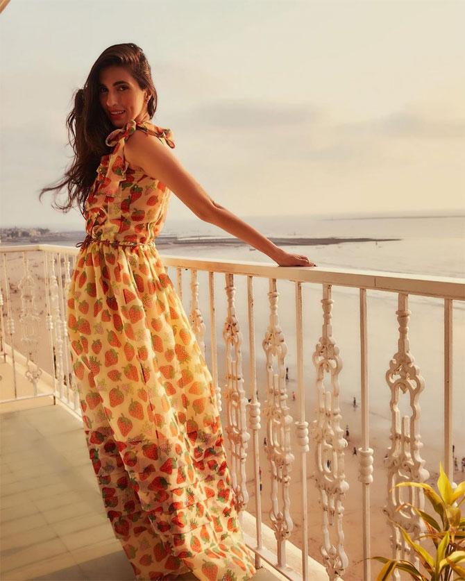 Prerna oozes oomph in this strawberry printed gown by popular fashion brand Gucci.