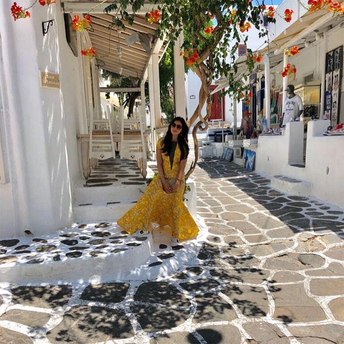 Prerna shines bright in Mykonos in this yellow dress. 