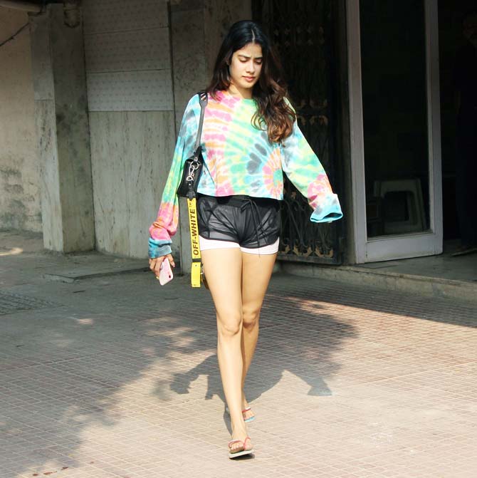 While Hrithik was clicked in his formal avatar, Janhvi Kapoor was in her usual chic avatar as she was clicked at her gym in the same suburb. The actress opted for a multi-coloured top and black shorts for the workout session.