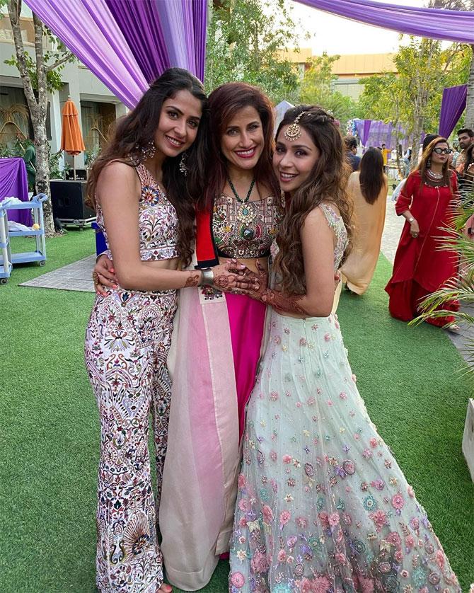 In picture: Yasmin Karachiwala poses with Sonaakshi Raaj and Malvika Raaj at the Mehendi ceremony.